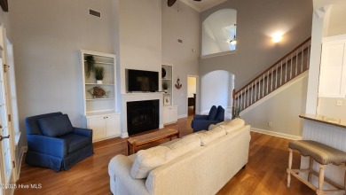 Step into this elegant 2900+ square foot home that combines on Brunswick Plantation and Golf Resorts in North Carolina - for sale on GolfHomes.com, golf home, golf lot