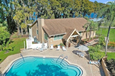 Enjoy the LOWER HOA fees with this Light and Bright, spacious on Highland Lakes Executive Golf Course in Florida - for sale on GolfHomes.com, golf home, golf lot