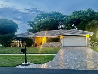 THIS HOME HAS EVERYTHING YOU ARE LOOKING FOR!  Totally upgrade & on Boca Greens Country Club in Florida - for sale on GolfHomes.com, golf home, golf lot
