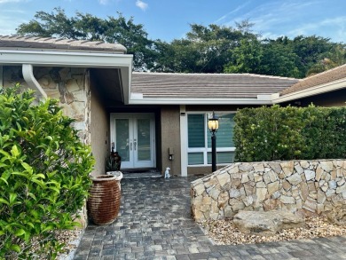 THIS HOME HAS EVERYTHING YOU ARE LOOKING FOR!  Totally upgrade & on Boca Greens Country Club in Florida - for sale on GolfHomes.com, golf home, golf lot