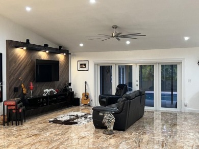THIS HOME HAS EVERYTHING YOU ARE LOOKING FOR!  Totally upgrade & on Boca Greens Country Club in Florida - for sale on GolfHomes.com, golf home, golf lot