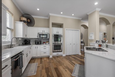 Stunning golf course home overlooking the 5th green of on Southwood Golf Club in Florida - for sale on GolfHomes.com, golf home, golf lot