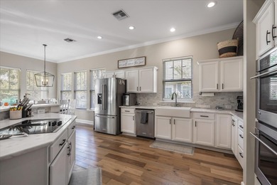 Stunning golf course home overlooking the 5th green of on Southwood Golf Club in Florida - for sale on GolfHomes.com, golf home, golf lot