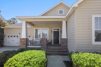 Stunning golf course home overlooking the 5th green of on Southwood Golf Club in Florida - for sale on GolfHomes.com, golf home, golf lot