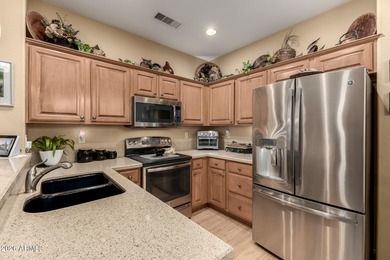 Welcome to this beautifully maintained 1400 sq ft 2 bedroom, 2 on Desert Springs Golf Course in Arizona - for sale on GolfHomes.com, golf home, golf lot