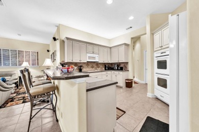Welcome to this beautifully maintained one-owner home nestled on on Regatta Bay Golf and Country Club in Florida - for sale on GolfHomes.com, golf home, golf lot