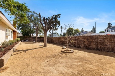 Attractive single story on a corner lot is ready for you! This on Alta Vista Country Club in California - for sale on GolfHomes.com, golf home, golf lot