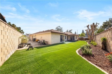 Attractive single story on a corner lot is ready for you! This on Alta Vista Country Club in California - for sale on GolfHomes.com, golf home, golf lot