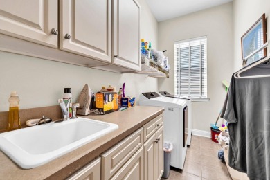 Welcome to this beautifully maintained one-owner home nestled on on Regatta Bay Golf and Country Club in Florida - for sale on GolfHomes.com, golf home, golf lot