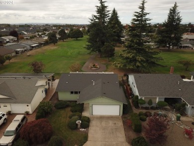 This home features an open floor plan with a view of two golf on Senior Estates Golf and Country Club in Oregon - for sale on GolfHomes.com, golf home, golf lot