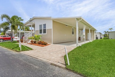 This stunning Skyline Home is ready and waiting for your arrival on Royal Wood Golf and Country Club in Florida - for sale on GolfHomes.com, golf home, golf lot