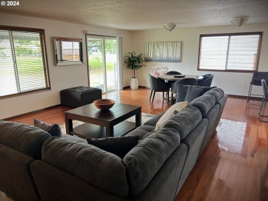 This home features an open floor plan with a view of two golf on Senior Estates Golf and Country Club in Oregon - for sale on GolfHomes.com, golf home, golf lot