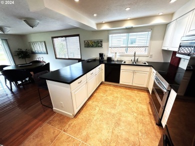 This home features an open floor plan with a view of two golf on Senior Estates Golf and Country Club in Oregon - for sale on GolfHomes.com, golf home, golf lot