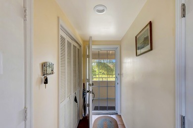 Discover this pristine furnished 2-bedroom, 2-bathroom steps on Oak Harbor Country Club in Florida - for sale on GolfHomes.com, golf home, golf lot