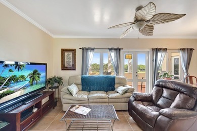 Discover this pristine furnished 2-bedroom, 2-bathroom steps on Oak Harbor Country Club in Florida - for sale on GolfHomes.com, golf home, golf lot