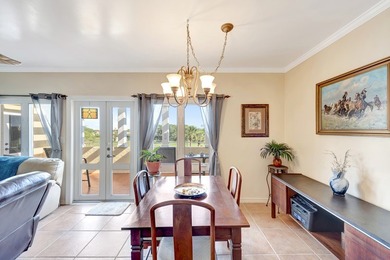 Discover this pristine furnished 2-bedroom, 2-bathroom steps on Oak Harbor Country Club in Florida - for sale on GolfHomes.com, golf home, golf lot