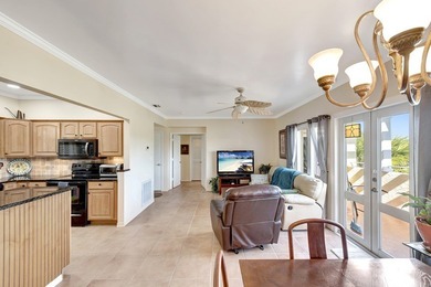 Discover this pristine furnished 2-bedroom, 2-bathroom steps on Oak Harbor Country Club in Florida - for sale on GolfHomes.com, golf home, golf lot