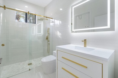 Exceptional, renovated paradise with private triple-fairway lake on Frenchmans Creek Country Club in Florida - for sale on GolfHomes.com, golf home, golf lot