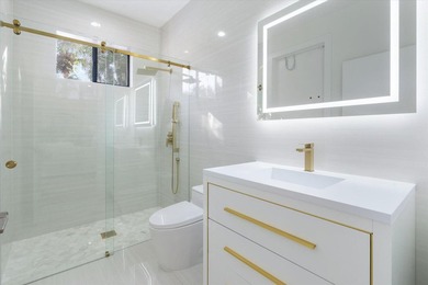 Exceptional, renovated paradise with private triple-fairway lake on Frenchmans Creek Country Club in Florida - for sale on GolfHomes.com, golf home, golf lot