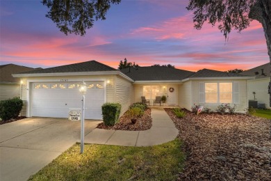 Welcome to this beautifully updated Banyan/Bougainvillea model on The Links of Spruce Creek in Florida - for sale on GolfHomes.com, golf home, golf lot
