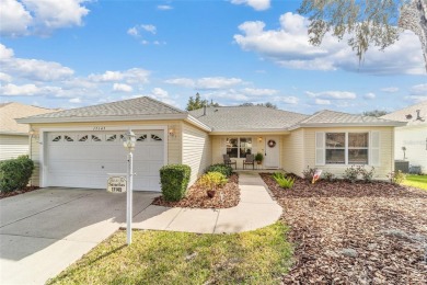 Welcome to this beautifully updated Banyan/Bougainvillea model on The Links of Spruce Creek in Florida - for sale on GolfHomes.com, golf home, golf lot