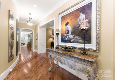This custom estate embodies luxury, privacy and timeless on The Palisades Country Club in North Carolina - for sale on GolfHomes.com, golf home, golf lot