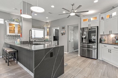 Stylish & Contemporary.  Located in Spruce Creek Fly-In's on Spruce Creek Golf Club in Florida - for sale on GolfHomes.com, golf home, golf lot