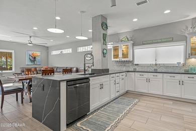 Stylish & Contemporary.  Located in Spruce Creek Fly-In's on Spruce Creek Golf Club in Florida - for sale on GolfHomes.com, golf home, golf lot