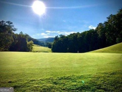 Here's your rare opportunity to own a stunning residence right on The Highlands Course at Lake Arrowhead in Georgia - for sale on GolfHomes.com, golf home, golf lot