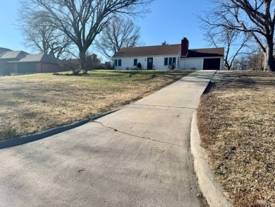 This 4-bedroom, 2-bathroom home, situated on a hilltop, offers on Concordia American Legion Golf Course in Kansas - for sale on GolfHomes.com, golf home, golf lot