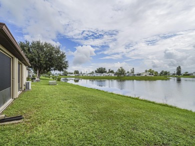 This stunning CBS home sits on a prime lot, offering serene on Spanish Lakes Fairways in Florida - for sale on GolfHomes.com, golf home, golf lot