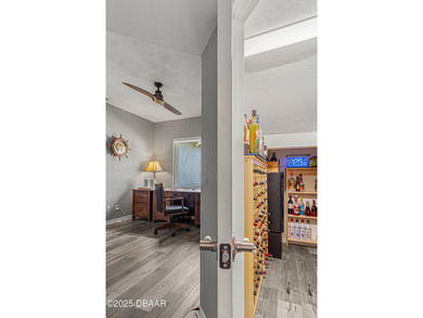 Stylish & Contemporary.  Located in Spruce Creek Fly-In's on Spruce Creek Golf Club in Florida - for sale on GolfHomes.com, golf home, golf lot