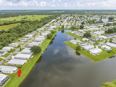 This stunning CBS home sits on a prime lot, offering serene on Spanish Lakes Fairways in Florida - for sale on GolfHomes.com, golf home, golf lot