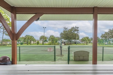 This stunning CBS home sits on a prime lot, offering serene on Spanish Lakes Fairways in Florida - for sale on GolfHomes.com, golf home, golf lot