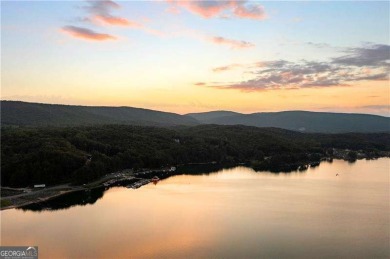 Here's your rare opportunity to own a stunning residence right on The Highlands Course at Lake Arrowhead in Georgia - for sale on GolfHomes.com, golf home, golf lot