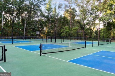 Here's your rare opportunity to own a stunning residence right on The Highlands Course at Lake Arrowhead in Georgia - for sale on GolfHomes.com, golf home, golf lot