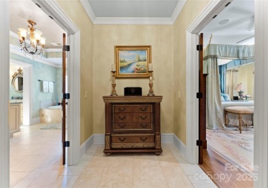 This custom estate embodies luxury, privacy and timeless on The Palisades Country Club in North Carolina - for sale on GolfHomes.com, golf home, golf lot