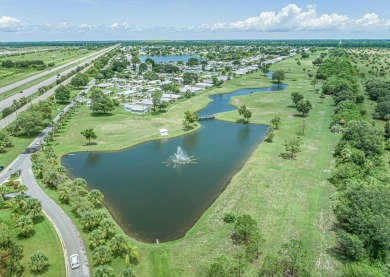 This stunning CBS home sits on a prime lot, offering serene on Spanish Lakes Fairways in Florida - for sale on GolfHomes.com, golf home, golf lot