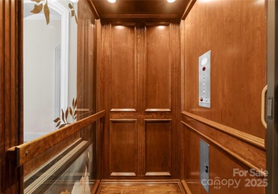 This custom estate embodies luxury, privacy and timeless on The Palisades Country Club in North Carolina - for sale on GolfHomes.com, golf home, golf lot