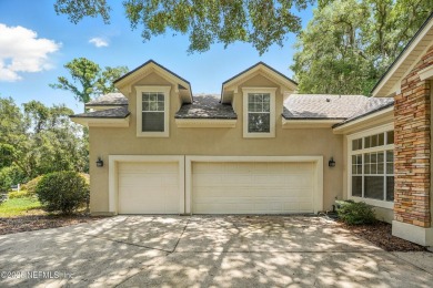 If you enjoy socializing and entertaining, this five-bedroom on Queens Harbour Yacht and Country Club in Florida - for sale on GolfHomes.com, golf home, golf lot
