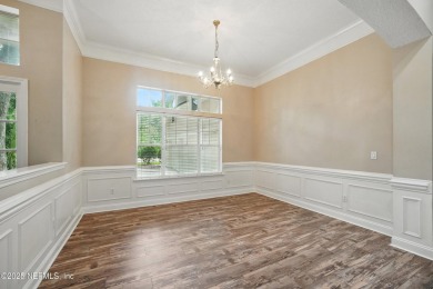 If you enjoy socializing and entertaining, this five-bedroom on Queens Harbour Yacht and Country Club in Florida - for sale on GolfHomes.com, golf home, golf lot