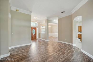 If you enjoy socializing and entertaining, this five-bedroom on Queens Harbour Yacht and Country Club in Florida - for sale on GolfHomes.com, golf home, golf lot