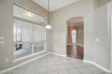 If you enjoy socializing and entertaining, this five-bedroom on Queens Harbour Yacht and Country Club in Florida - for sale on GolfHomes.com, golf home, golf lot