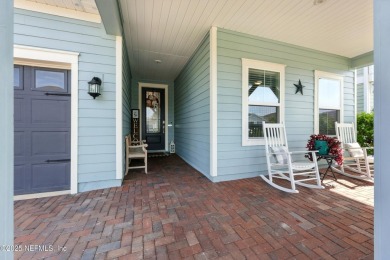 This immaculate home built in 2021 is MOVE IN READY and offers on Golf Club At South Hampton in Florida - for sale on GolfHomes.com, golf home, golf lot