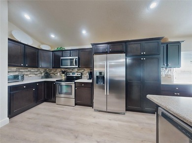 This LOVELY 3/2 IRIS Designer sits on an OVERSIZED lot with on Pennbrooke Fairways in Florida - for sale on GolfHomes.com, golf home, golf lot