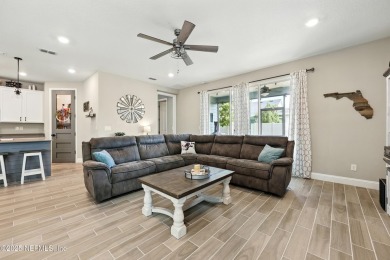 This immaculate home built in 2021 is MOVE IN READY and offers on Golf Club At South Hampton in Florida - for sale on GolfHomes.com, golf home, golf lot
