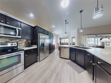 This LOVELY 3/2 IRIS Designer sits on an OVERSIZED lot with on Pennbrooke Fairways in Florida - for sale on GolfHomes.com, golf home, golf lot