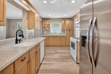 Spacious 2BR/2BA on Large Corner Lot in Leisureville! Bright and on Leisureville Community Golf Course in Florida - for sale on GolfHomes.com, golf home, golf lot