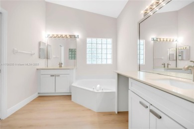 Beautifully updated LAKE FRONT 3-bed, 2-bath home in Grand on Grand Palms Hotel and Golf Resort in Florida - for sale on GolfHomes.com, golf home, golf lot