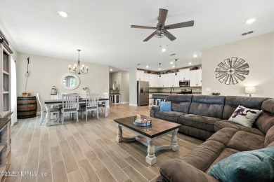 This immaculate home built in 2021 is MOVE IN READY and offers on Golf Club At South Hampton in Florida - for sale on GolfHomes.com, golf home, golf lot